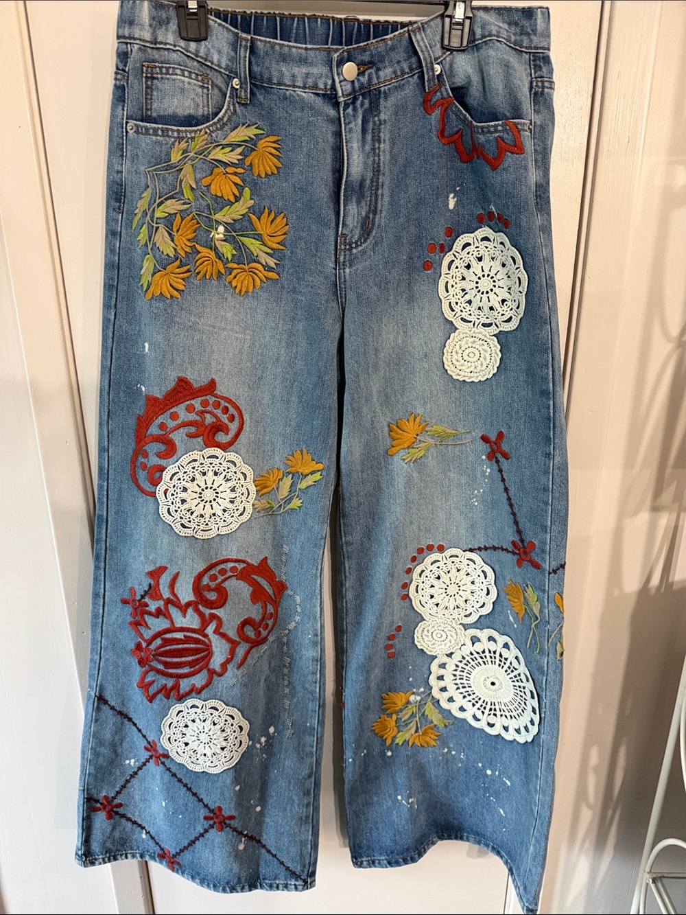 Embroidered Blue Denim Wide-Leg Jeans with Floral Appliqué